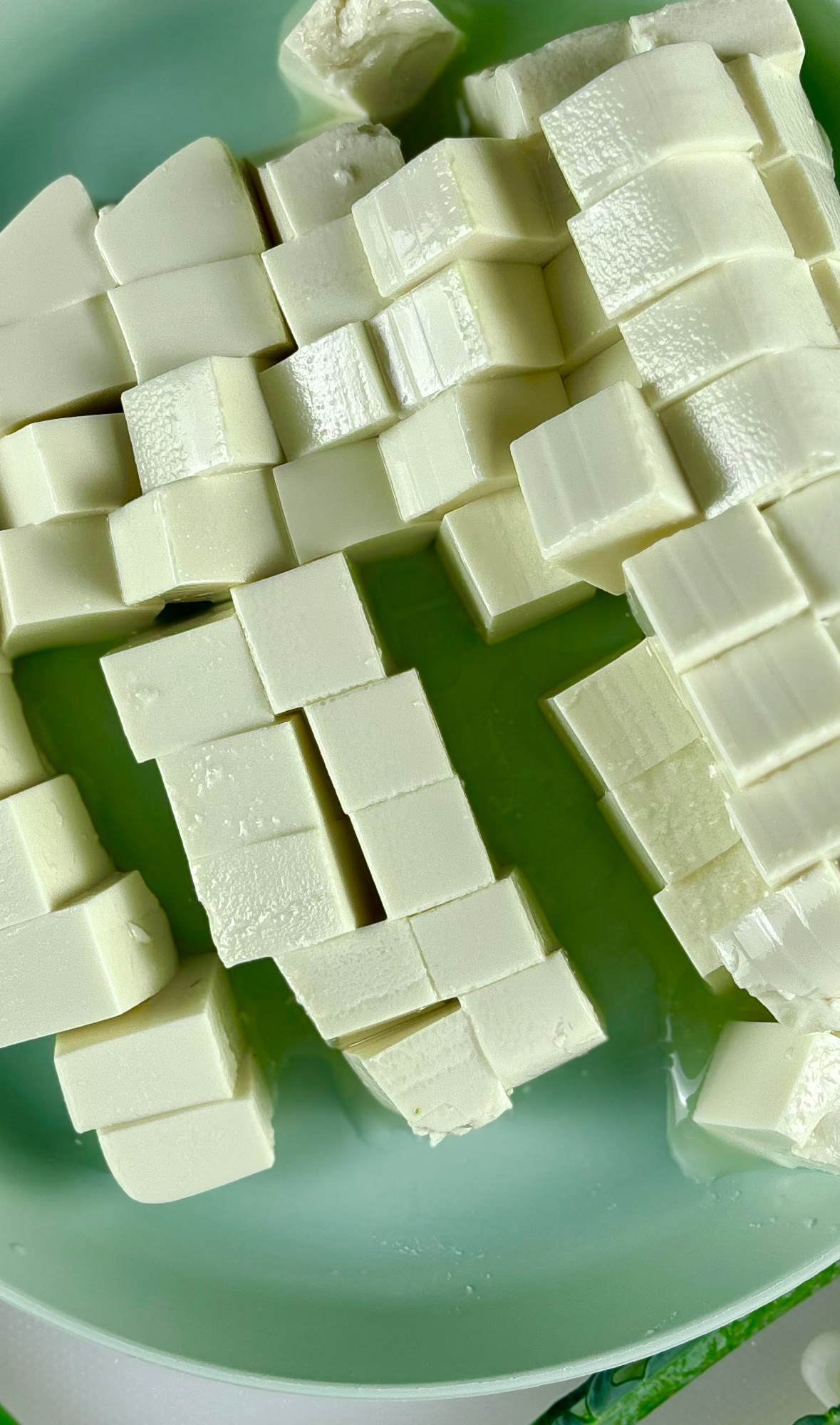 Tofu cut up into cubes.