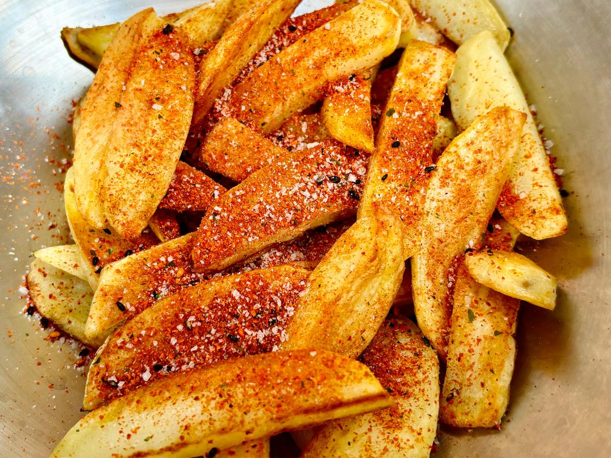 Home-cooked potato fries seasoned with Japanese shichimi togarashi spices and sea salt.