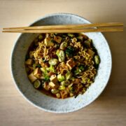 Large ceramic bowl of six minute Japanese ramen noodles with tofu and vegetables