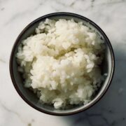 Cooked perfectly fluffy japanese rice in a bowl