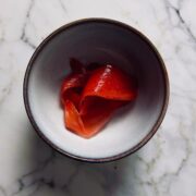 Pink pickled ginger in a ceramic bowl
