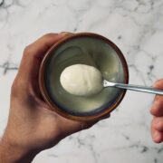 a teaspoon of wasabi mayo over a small bowl