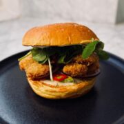 Oyster mushroom burger on a round plate