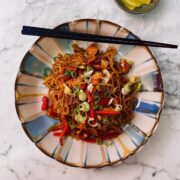 Serving of tofu noodles in a patterned bowl