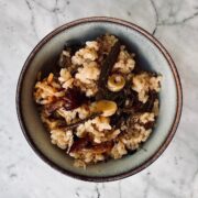 Bowl of vegan Japanese mountain vegetable rice (sansai gohan) with seasonal greens and wild vegetables over sticky rice