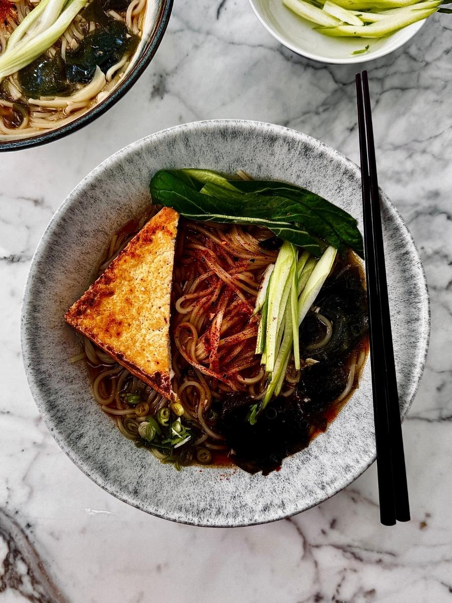 birdseye view of a bowl of shio ramen with toppings