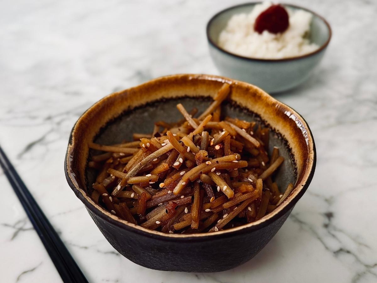 Finished Kinpira Gobo served next to steamed rice, ready in 5 minutes
