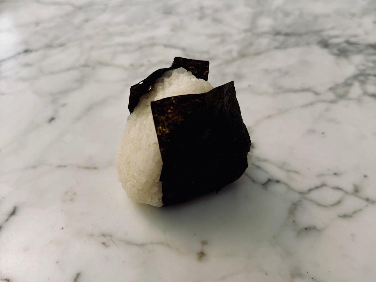 hand made onigiri with nori sheet wrapped around