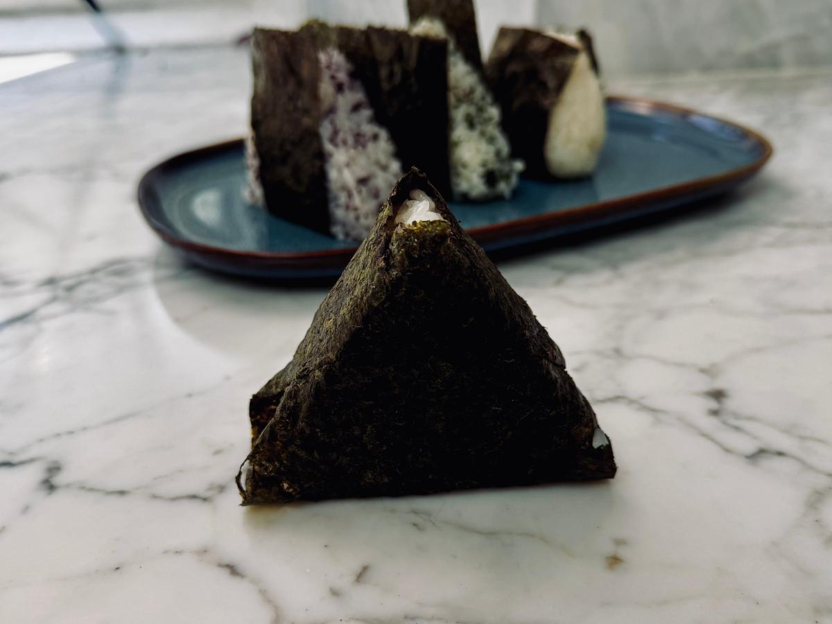 Onigiri vegan rice ball wrapped in nori.