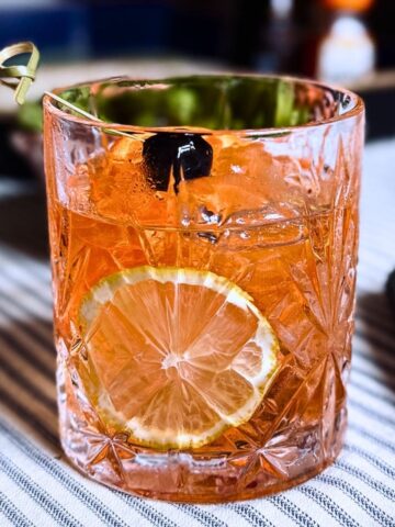 sake old fashioned on a cotton table cloth