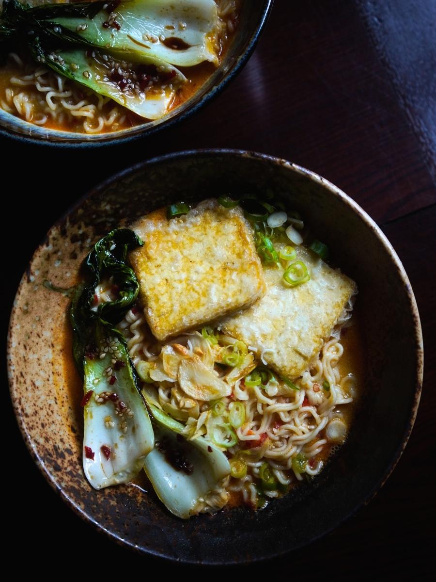 yuzu ramen pictured from above on a dark wooden table
