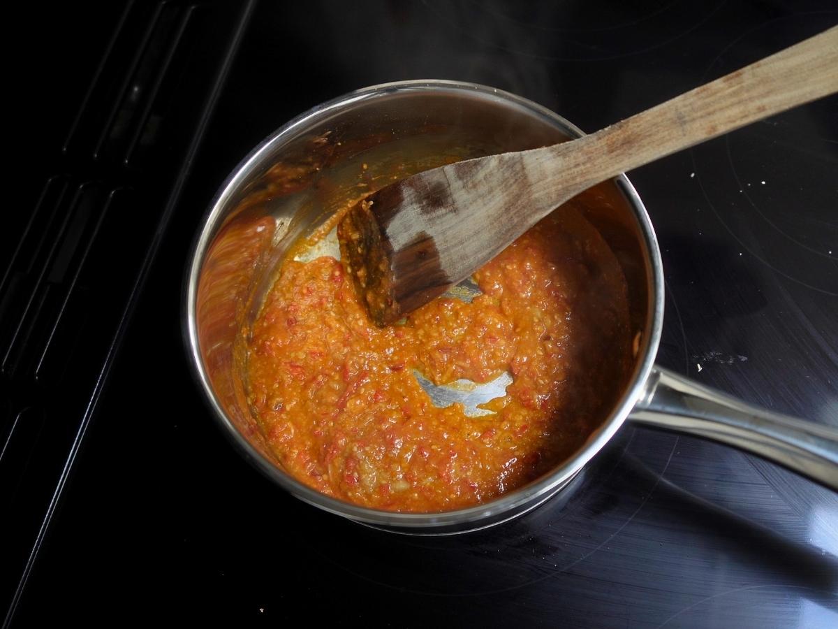 paste added to the pan, sauté-ing with the aromatics
