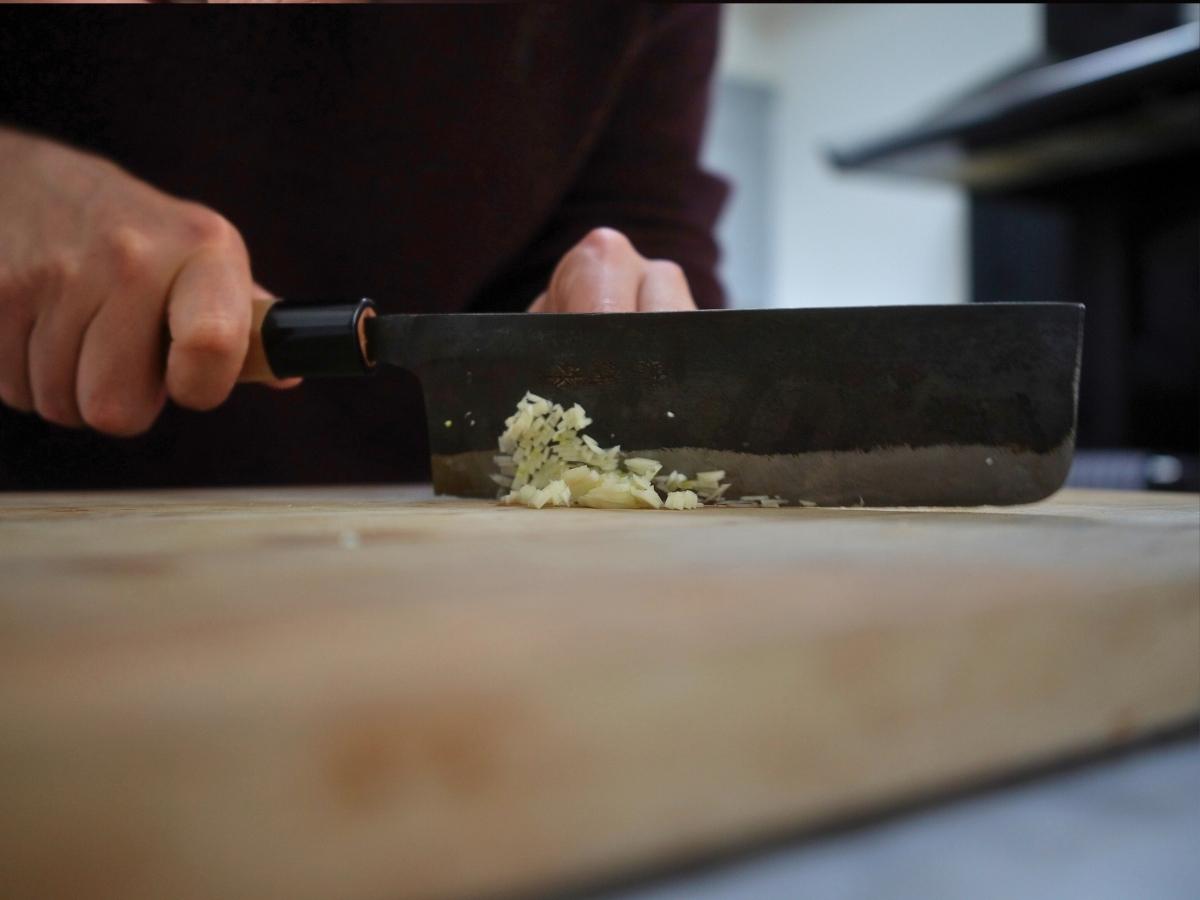 garlic being minced
