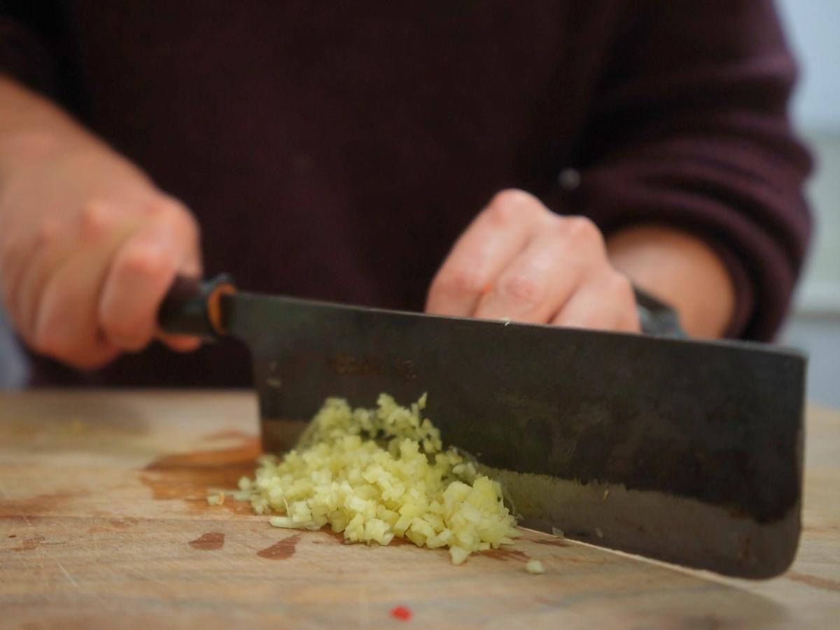 ginger being minced
