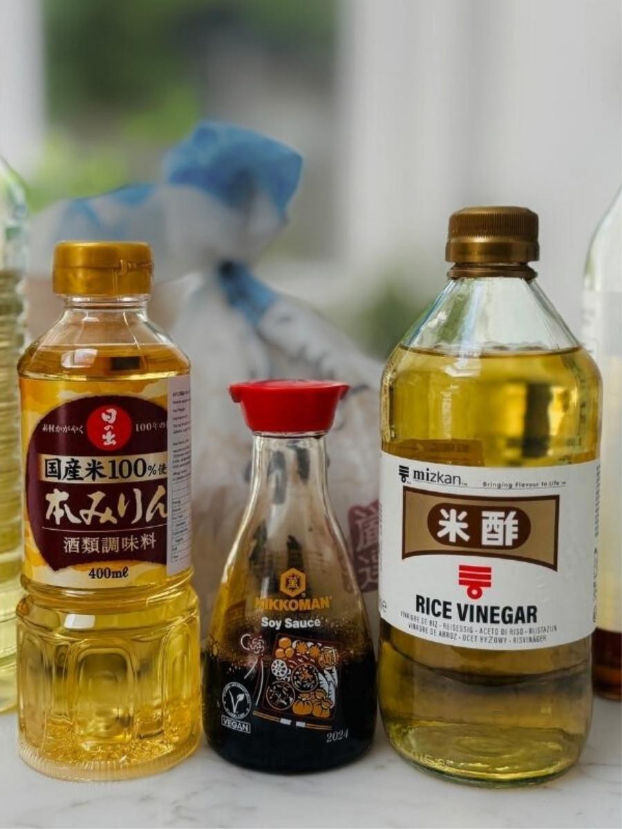 close up of a bottle of mirin, shoyu and rice vinegar